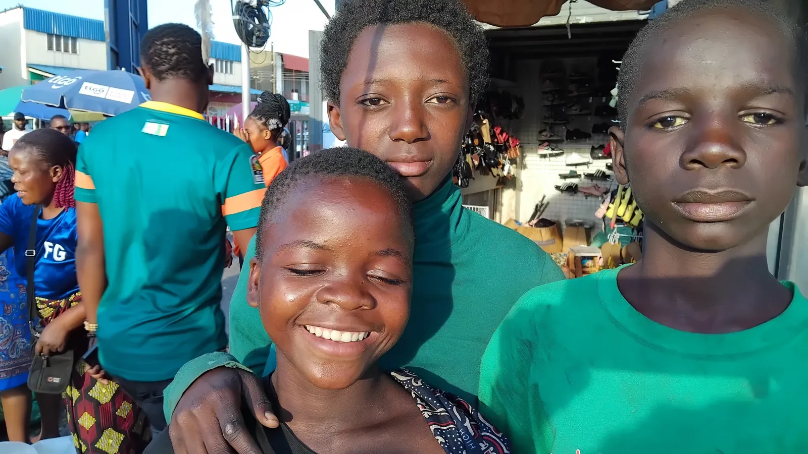 Children and teenagers in a street market in Lusaka, Zambia